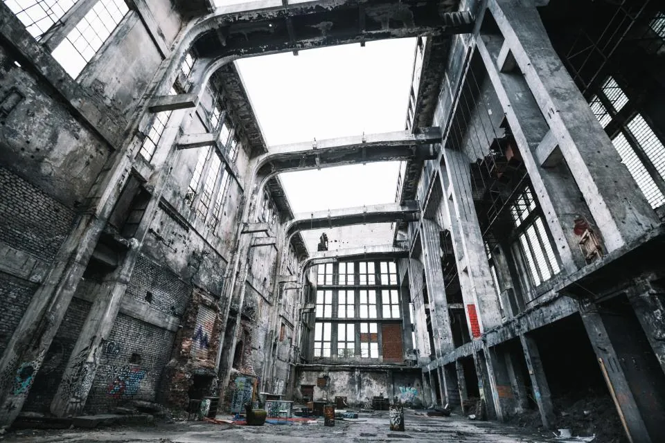 The stripped concrete interior of a building shell before conversion works begin